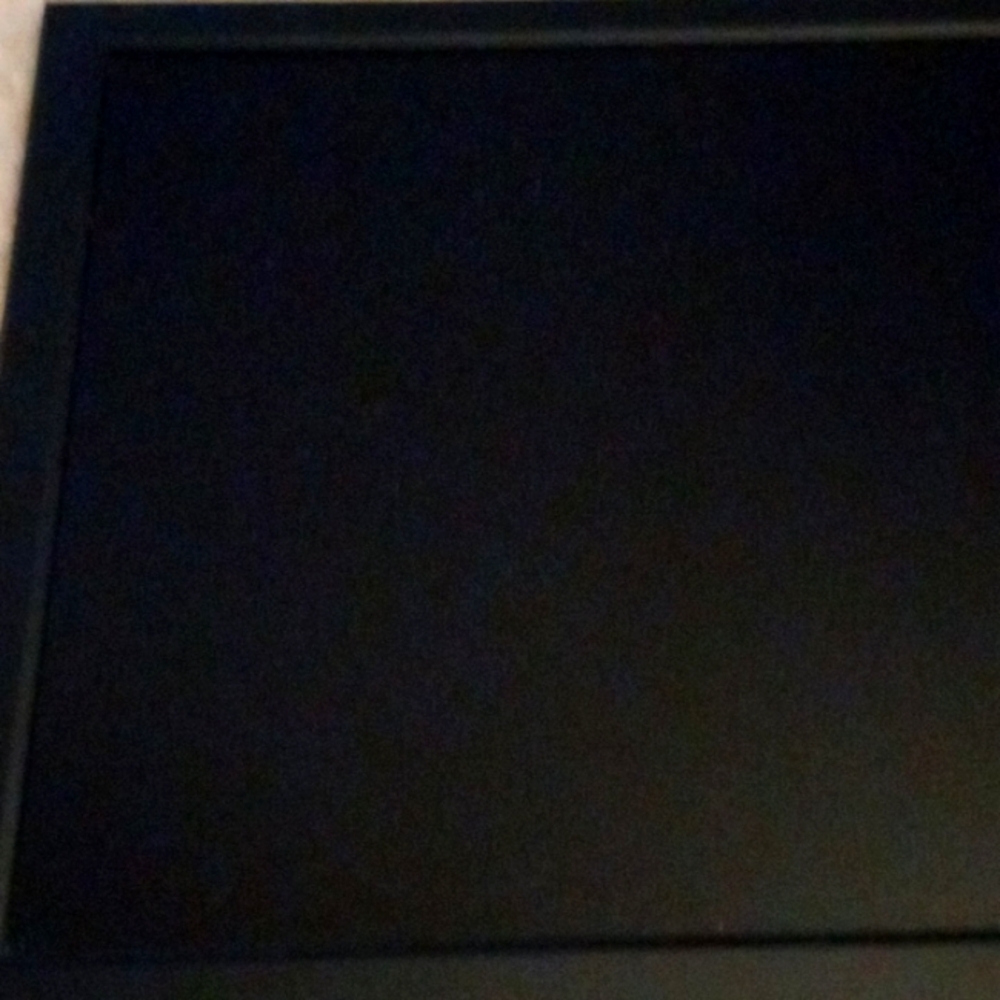 A black dry erase board!